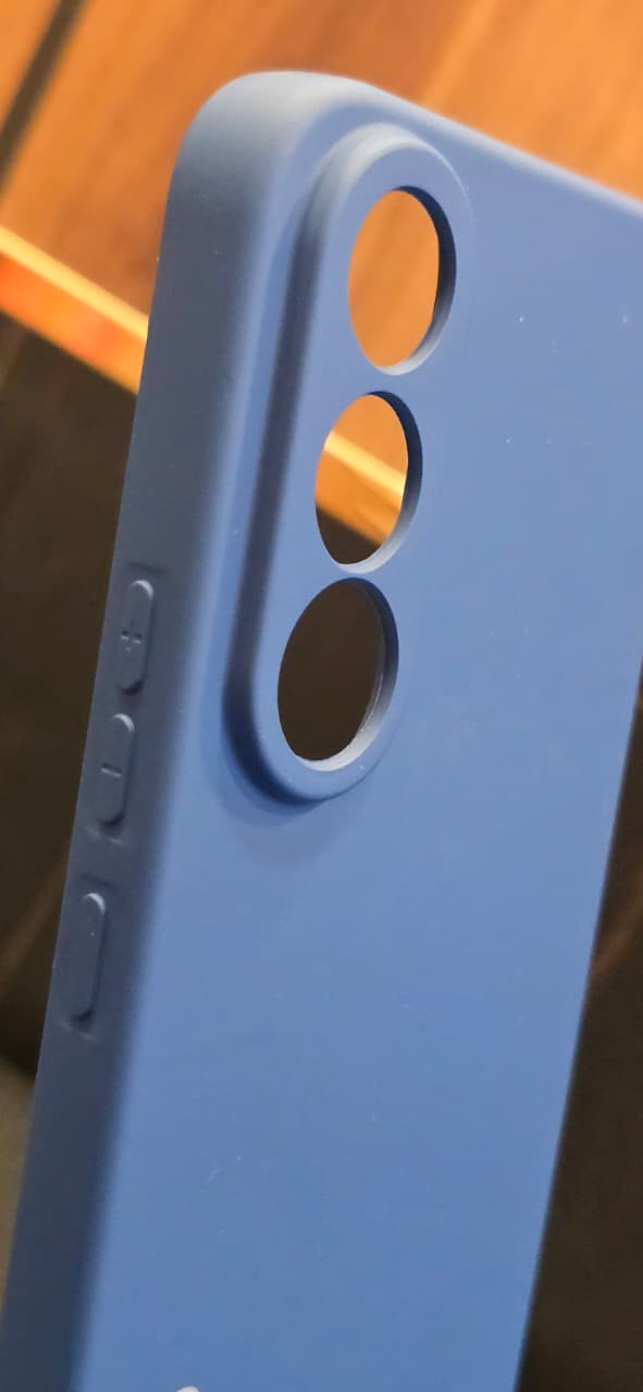 AMIRRS always trendy & tech blue silicone phone case with raised camera protection and soft-touch matte finish.