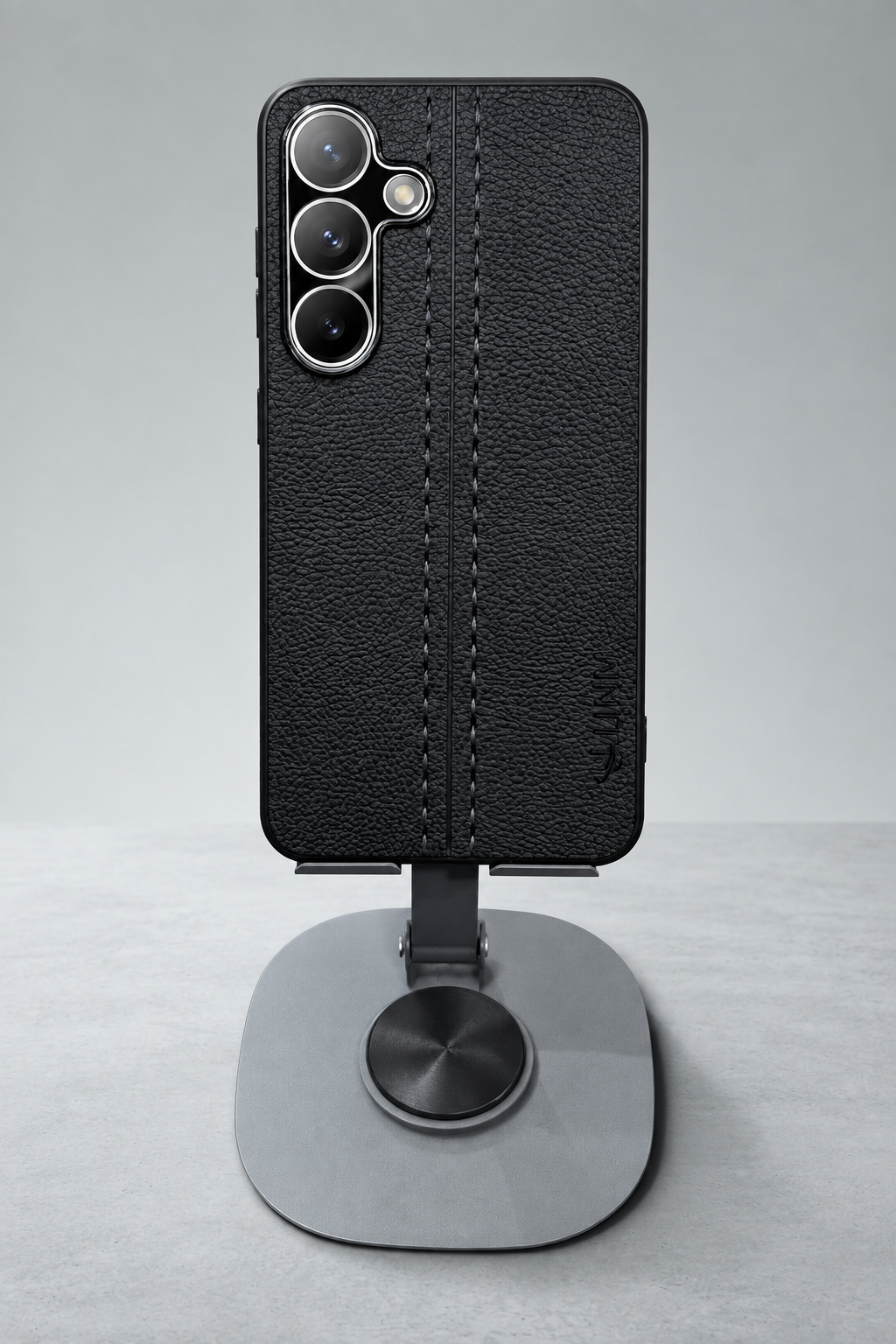 Black leather-texture case with magnetic ring stand, front view